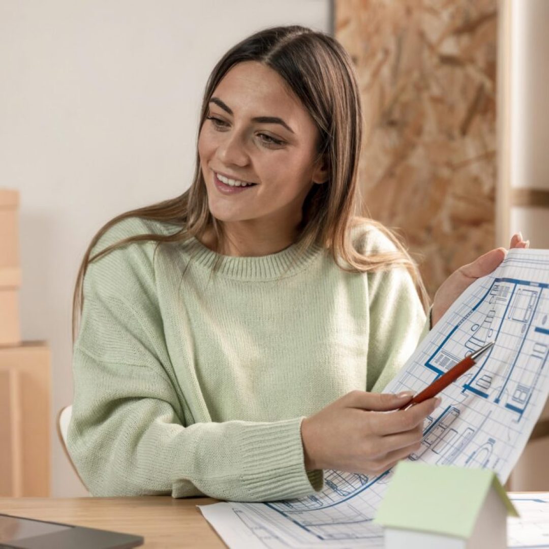 medium-shot-woman-holding-plan